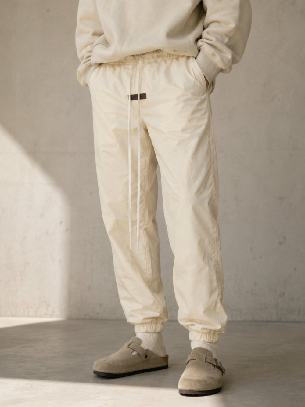 Women Fear of God ESSENTIALS Nylon Taslan track pants Size 10 NWOT